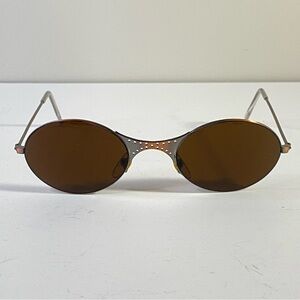 Vintage Brown Oval Sunglasses with Silver Accents